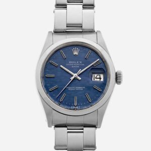 Reloj Rolex acero clásico fondo azul. Referencia 1500